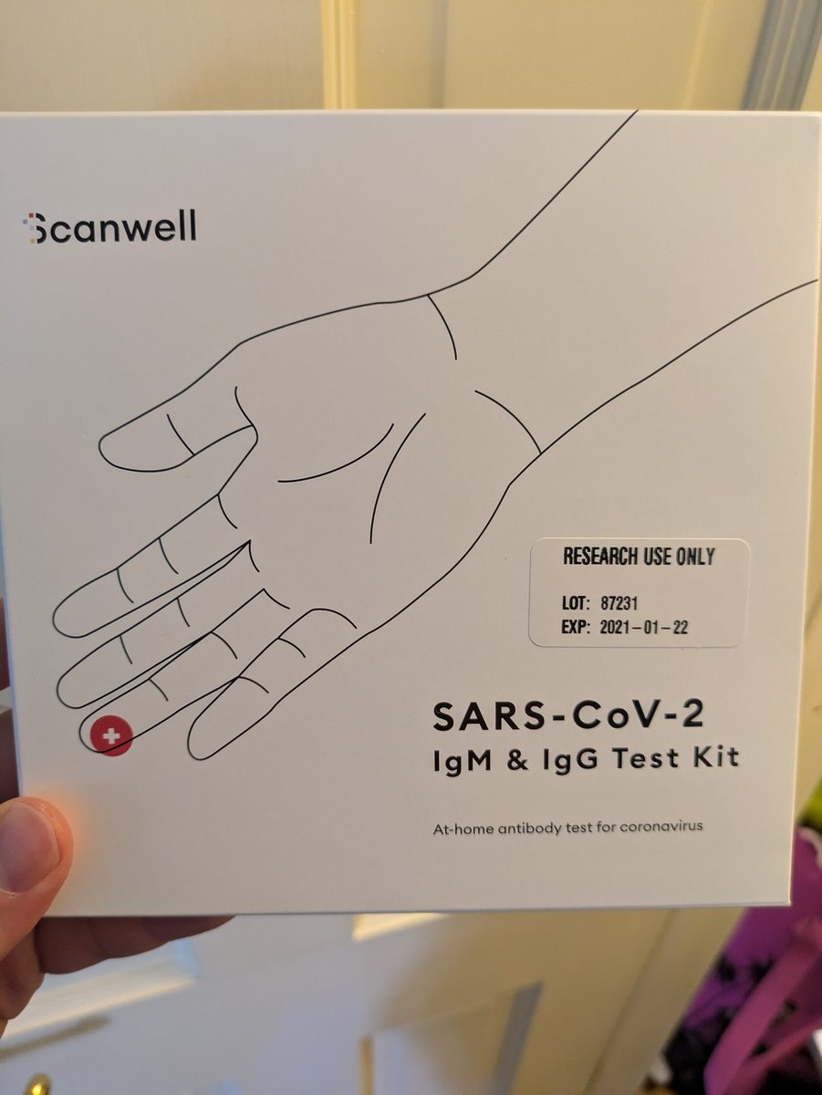 A Scanwell at-home SARS-CoV-2 IgM and IgG test kit used during the COVID-19 Community Research Partnership representing a point-of-care serologic (antibody) test.